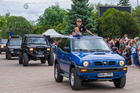 May 22, 2022 Beltsy, Moldova. Illustrative editorial. Club of fans of SUVs at the city parade