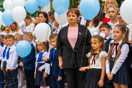 September 1, 2022 Balti Moldova. Schoolchildren on the line dedicated to the first bell. Illustrative editorial. Backgroundのeditorial素材
