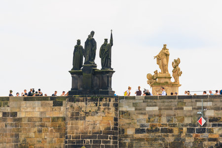 August 25, 2022 Prague, Czech Republic. Antique sculptures on the Charles Bridge. Background with copy spaceのeditorial素材