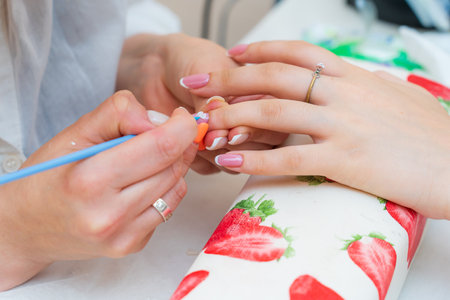 May 17, 2022 Balti Moldova. The process of creating a manicure. Illustrative editorial. Backgroundのeditorial素材