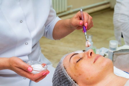 May 17, 2022 Balti Moldova. Beautician performs the procedure. Illustrative editorial. Backgroundのeditorial素材