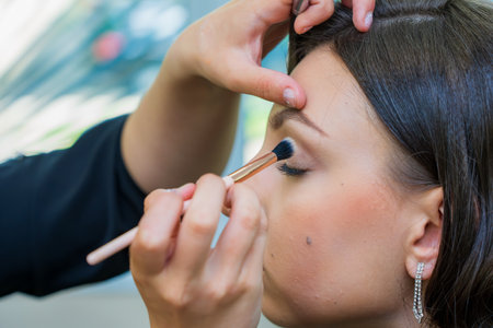 May 17, 2022 Balti Moldova. The process of applying makeup. Illustrative editorial. Backgroundのeditorial素材