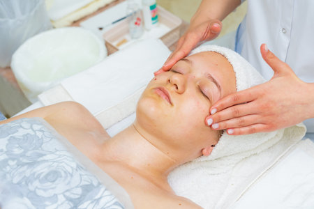 May 17, 2022 Balti Moldova. Beautician performs the procedure. Illustrative editorial. Backgroundのeditorial素材