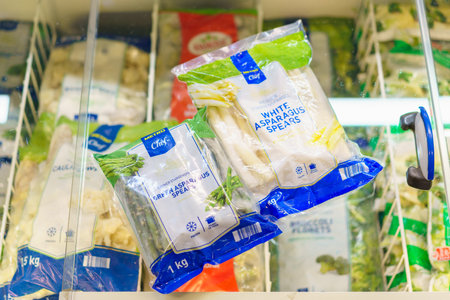 Frozen green and white asparagus spears in a package. February 2, 2023 Beltsy, Moldova. For...