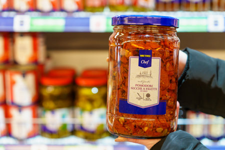 Canned chopped sundried tomatoes. March 9, 2023 Beltsy, Moldova. For illustrative editorial use.のeditorial素材