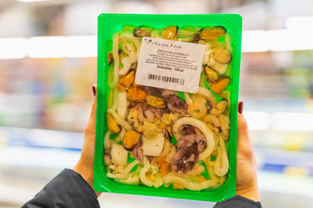 January 20, 2023 Beltsy, Moldova. For illustrative editorial use. Seafood mix in a package.のeditorial素材