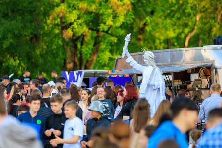 May 19, 2023 Beltsy, Moldova. For illustrative editorial use. Living sculpture of the Statue of Liberty. American Culture Days Celebrationのeditorial素材