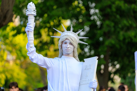 May 19, 2023 Beltsy, Moldova. For illustrative editorial use. Living sculpture of the Statue of Liberty. American Culture Days Celebrationのeditorial素材