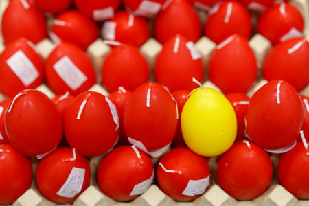 April 6, 2023 Beltsy, Moldova. For illustrative editorial use. Candles in the shape of an Easter egg.のeditorial素材