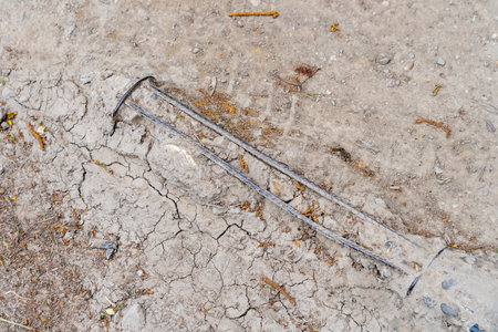 The sidewalk is broken and unsuitable for people with limited mobility. Dangerous urban environment. Background with copy space for textの写真素材