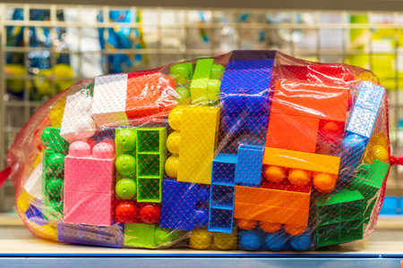 Constructor toy for children in the store. Educational gift for children. Background with selective focus and copy spaceの写真素材