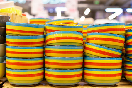 Plates and dishes in a wholesale and retail store. Background with selective focus and copy space for textの写真素材