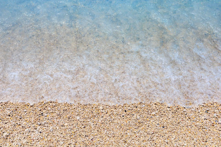 Seashore of small white pebbles on the beach in Oludeniz, lagoon. The cleanest beach with a blue flag. Backgroundの写真素材