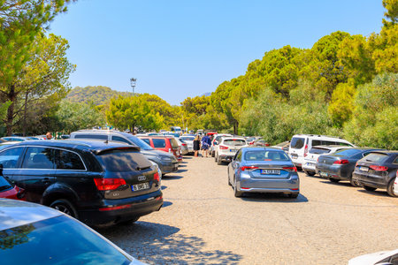 August 11, 2023 Oludeniz Turkey. For illustrative editorial use. The problem of lack of parking on the beach during the tourist seasonのeditorial素材