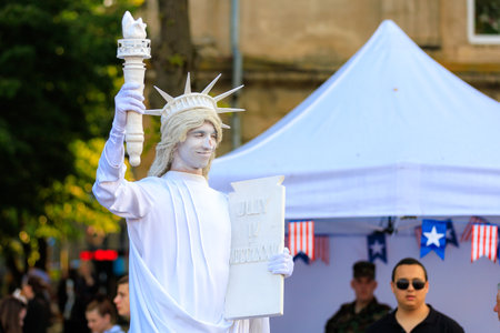 May 19, 2023 Beltsy, Moldova. For illustrative editorial use. Living sculpture of the Statue of Liberty. American Culture Days Celebrationのeditorial素材
