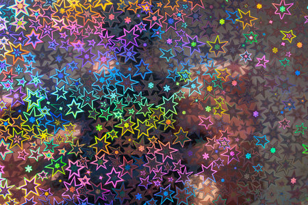 Holographic paper with a geometric pattern. Background or backdrop, graphic resource