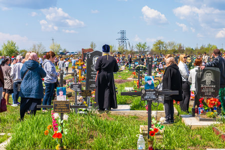 April 23, 2023 Beltsy, Moldova. For illustrative editorial use. Memorial Days at the Cemetery