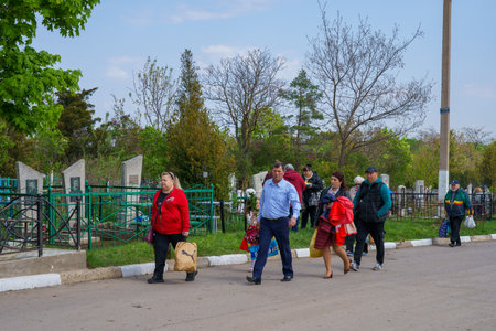 May 1, 2022 Beltsy, Moldova. For illustrative editorial use. People go to the cemetery on funeral daysのeditorial素材
