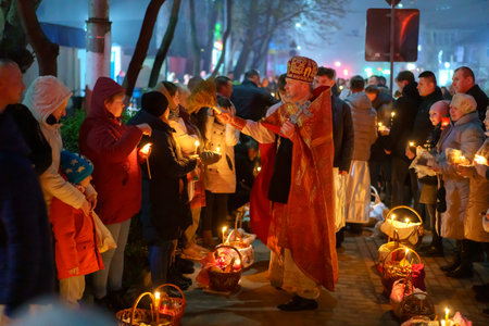 April 16, 2023 Beltsy, Moldova. For illustrative editorial use. People in church at Easter