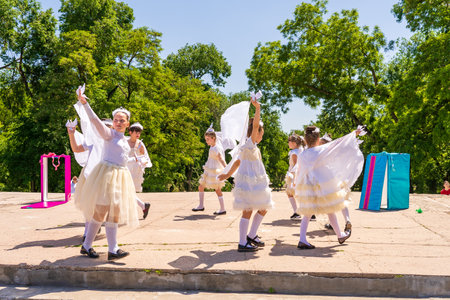 June 1, 2023 Beltsy, Moldova. For illustrative editorial use. Children dancing in the city
