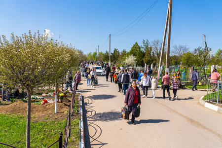 April 23, 2023 Beltsy, Moldova. For illustrative editorial use. Memorial Days at the Cemeteryのeditorial素材