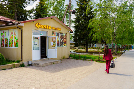May 23, 2023 Dobruja village, Singerei district, Moldova. For illustrative editorial use. Shop in the villageのeditorial素材