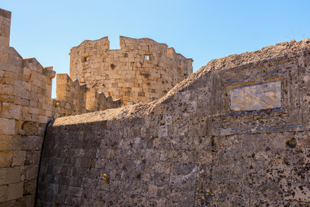 August 7, 2023 Rhodes Greece. For illustrative editorial use. Towers of an ancient fortress, backgroundのeditorial素材