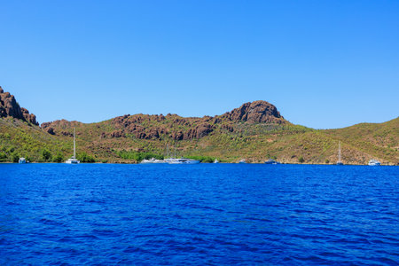 August 8, 2023 Mugla Turkey, Aegean Islands. For illustrative editorial use. Yacht mooring in the bay at the resortのeditorial素材