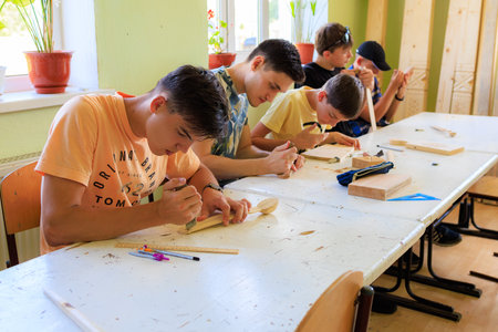 June 21, 2023 Rautel Moldova. For illustrative editorial use. Children doing folk craftsのeditorial素材
