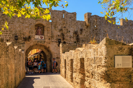 August 7, 2023 Rhodes Greece. For illustrative editorial use. Arched entrance to the old city, backgroundのeditorial素材
