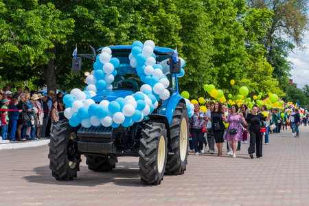May 22, 2022 Beltsy, Moldova. For illustrative editorial use. Cars and heavy equipment at the parade dedicated to City Dayのeditorial素材