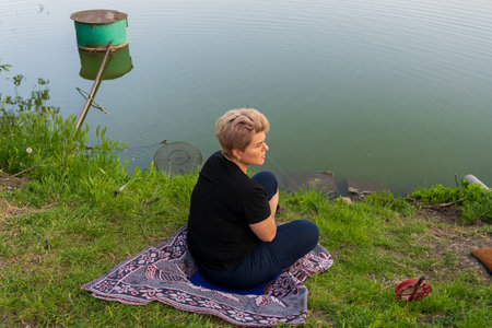 May 23, 2023 Dobruja village, Singerei district, Moldova. For illustrative editorial use. Fishermen fishingのeditorial素材