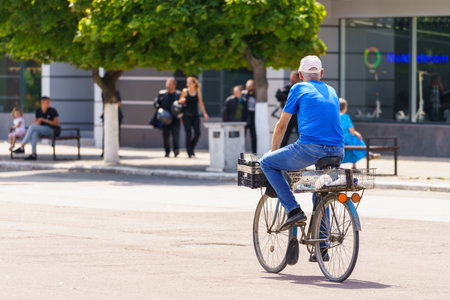 July 9, 2023 Beltsy, Moldova. For illustrative editorial use. Cyclist on a city streetのeditorial素材