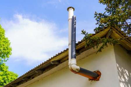 Autonomous heating exhaust pipe. Background with selective focus and copy space for text.