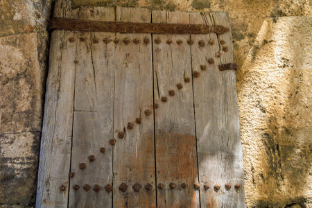 Antique wooden gate. Background with selective focus and copy space for text