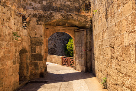 Arched vault of an ancient city. Background with selective focus and copy space for textの写真素材