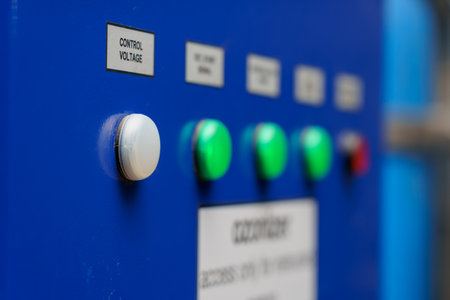 Buttons on a factory machine. Background with selective focus and copy space for text