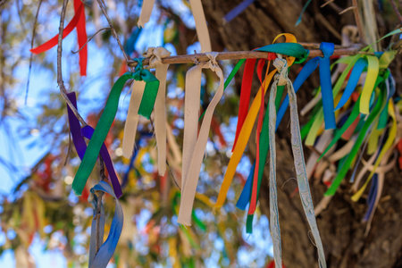 Colored ribbons for good luck, popular customs and superstitions. Background with selective focus and copy space for textの写真素材