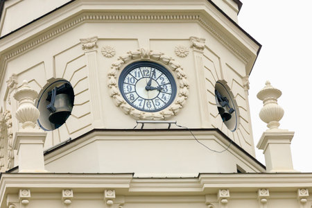 Ancient clock on the city tower. Background with selective focus and copy space for text
