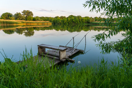 Fishing spot in the village. Background with selective focus and copy space for textの写真素材