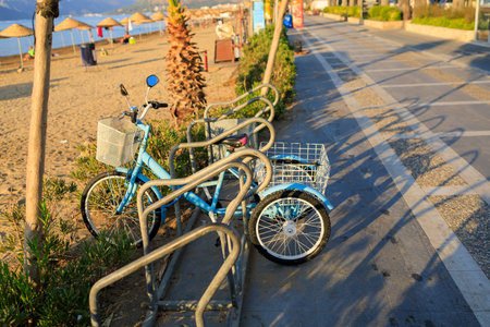 Tricycle with luggage baskets. Background with selective focus and copy space for text.の写真素材