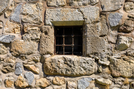 Window in an ancient fortress. Background with selective focus and copy space for text.