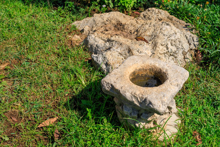Fragments of ancient architecture with decorative stone carvings. Background, selective focus and copy space for textの写真素材
