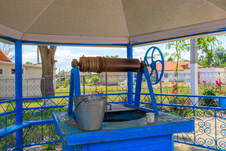 Well with drinking water. Background with selective focus and copy space for text.の写真素材