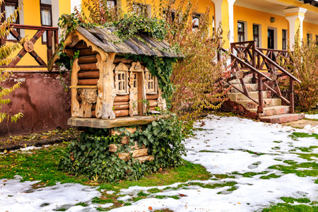 Decorative wooden rural house. Background with selective focus and copy space for textの写真素材