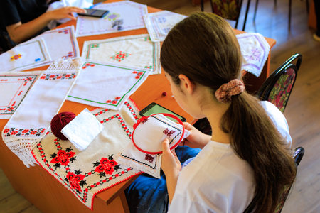 Embroidery is the main women's hobby in the village. Background with selective focus and copy space...