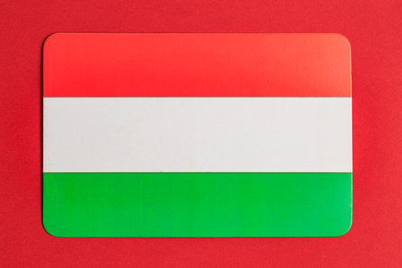 Hungary flag with red, white, and green stripes on solid background.の写真素材