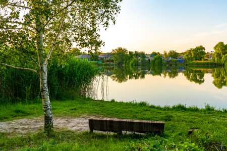 Lake in the village. Background with selective focus and copy space for textの写真素材