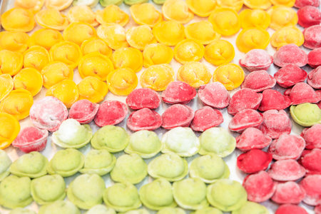 Dumplings in the workshop at a semi-finished products factory. Background with selective focus and copy space for textの写真素材