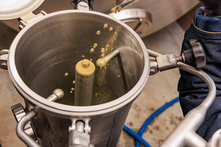 Stainless steel filtration process with flowing particles.の写真素材
